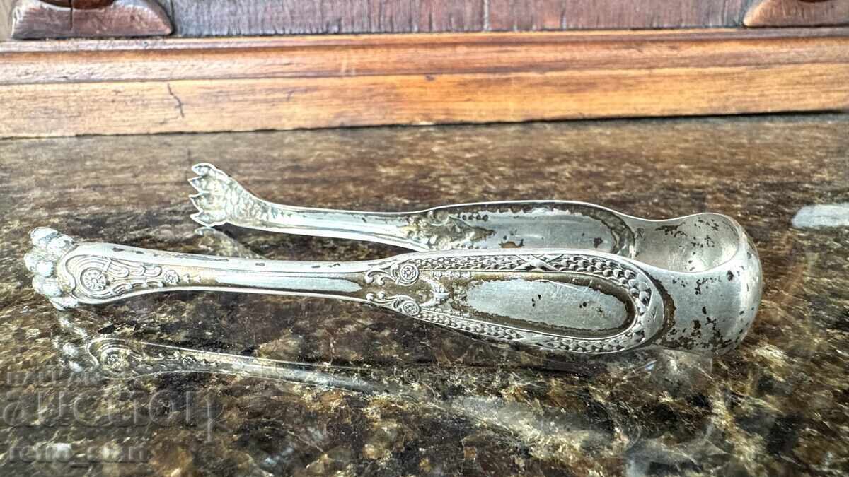 Delivery of Silver ice tongs, for sugar. Weight 30 grams