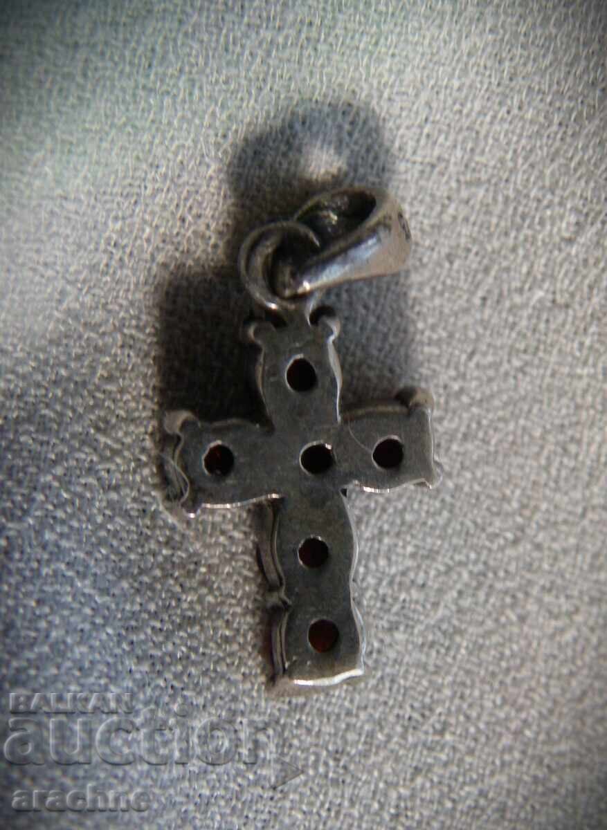 Auction  Silver cross with rubies