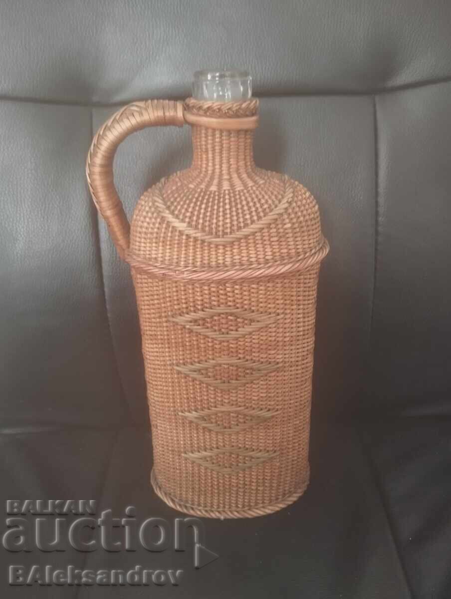 Old wicker bottle