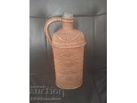 Old wicker bottle