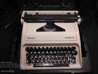 OLD RETRO PORTABLE TYPEWRITER OLYMPIA CARINA 2