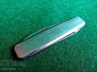 Vintage German pocket knife with match striker and nail file