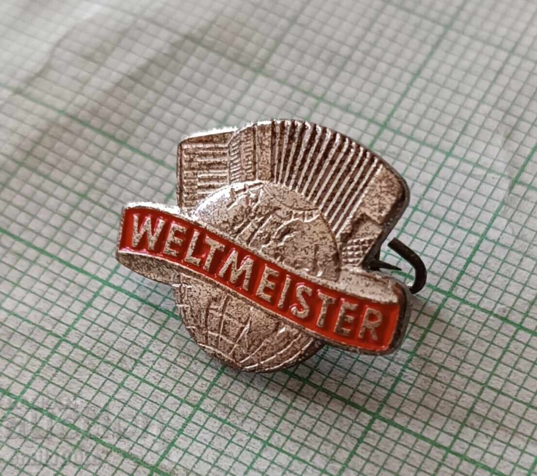 Auction Weltmeister Accordion - Badge Auction Weltmeister Accordion - Badge