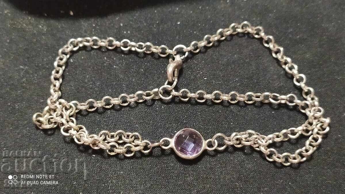 Auction  Grivna with a natural stone resembling amethyst