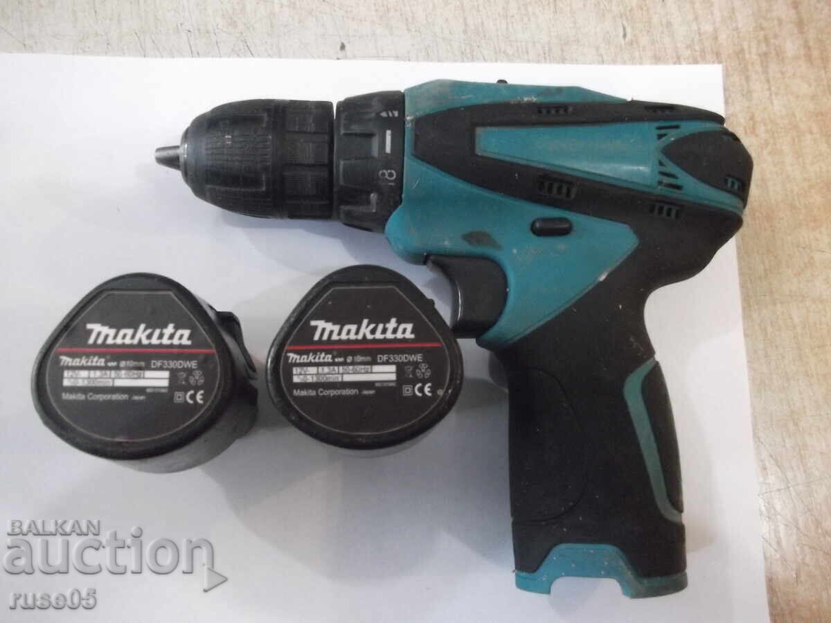 Auction Drill "Makita - DF330DWE" rechargeable working Auction Drill "Makita - DF330DWE" rechargeable working