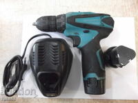 Mașină de găurit "Makita - DF330DWE" cu acumulator, funcțională