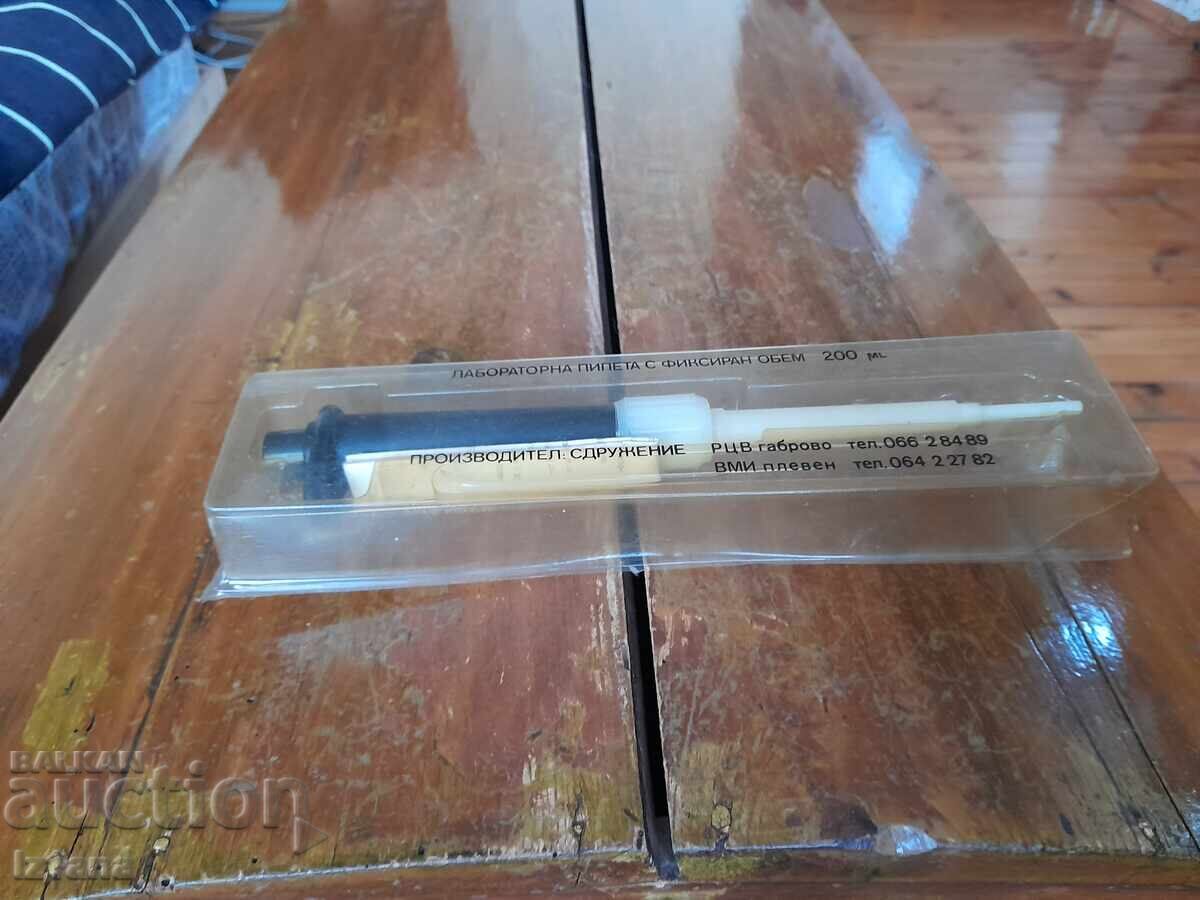 An old laboratory pipette An old laboratory pipette