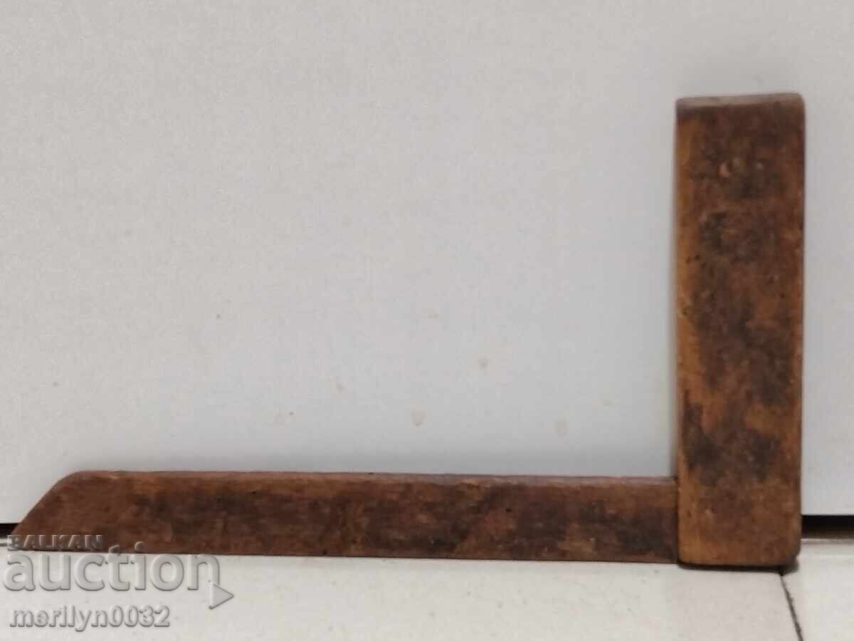 Old carpentry angle wooden tool