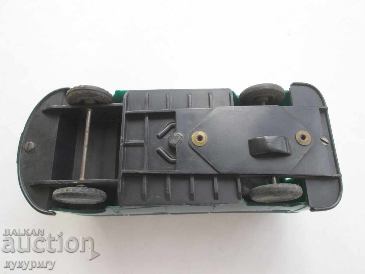 Delivery of Old Soviet plastic toy car VW T1 bus Post Office Delivery of Old Soviet plastic toy car VW T1 bus Post Office