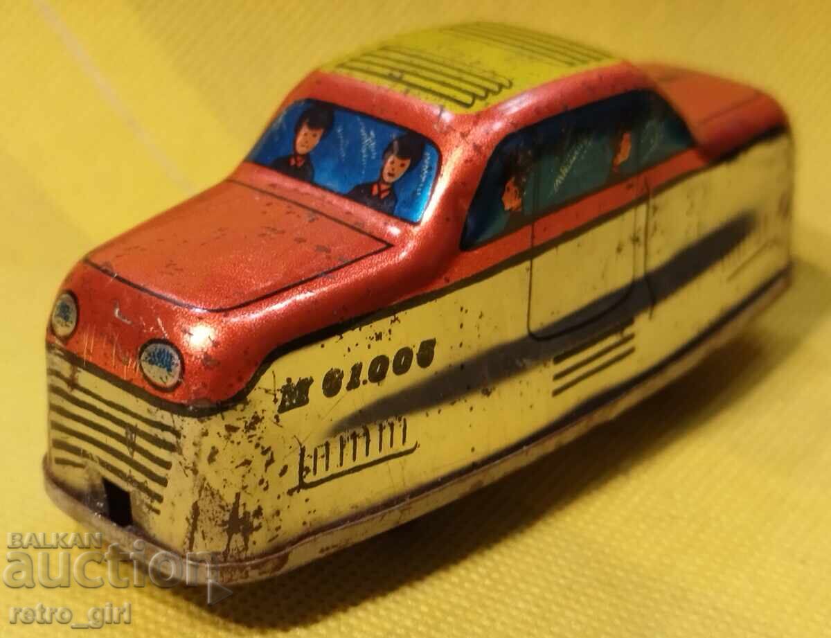 Auction An old tin toy. Auction An old tin toy.