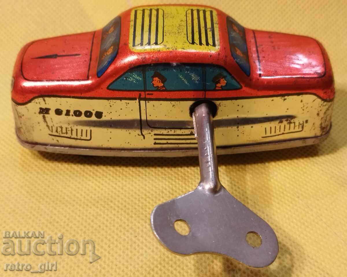 An old tin toy. - 5 An old tin toy. - 5
