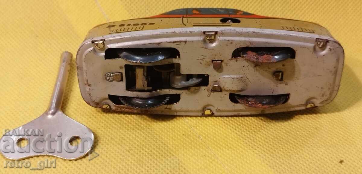 An old tin toy. - 6 An old tin toy. - 6