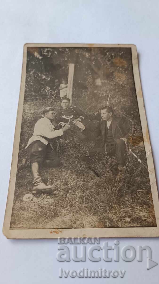 Picture of Two Officers and a Man Eating Watermelon Picture of Two Officers and a Man Eating Watermelon