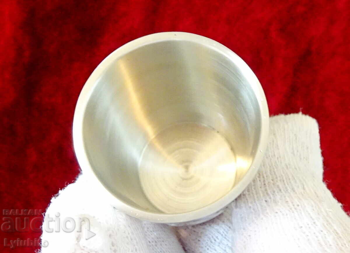 Auction Two pewter cups, shot glasses with merry drunks Auction Two pewter cups, shot glasses with merry drunks