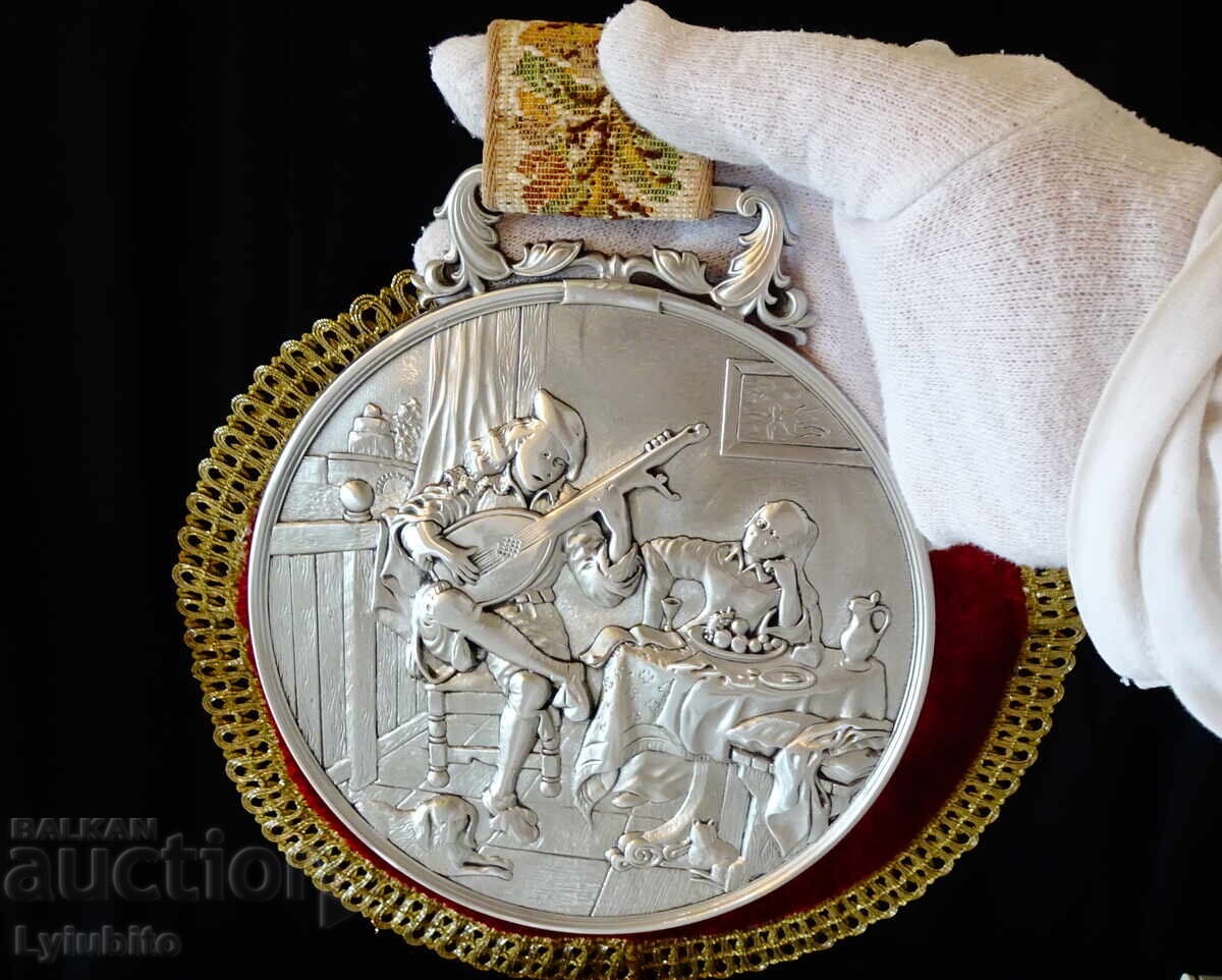 Auction  Tin plaque of a Lutenist, WMF