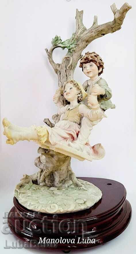 Auction Large Capodimonte porcelain figurine signed B. Merli Auction Large Capodimonte porcelain figurine signed B. Merli