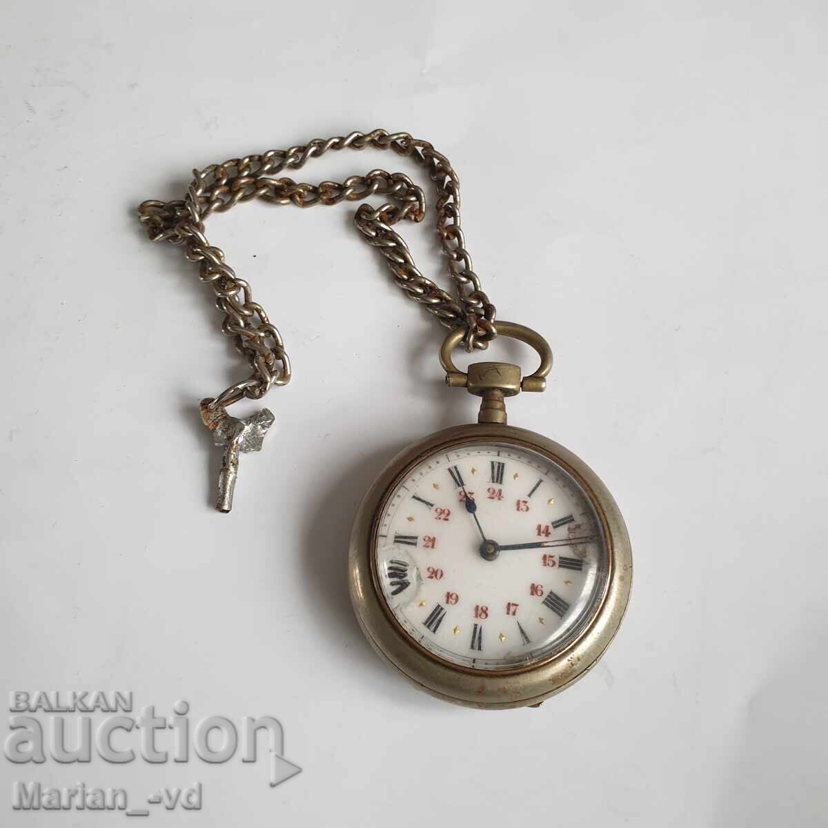 Old pocket watch with key Old pocket watch with key