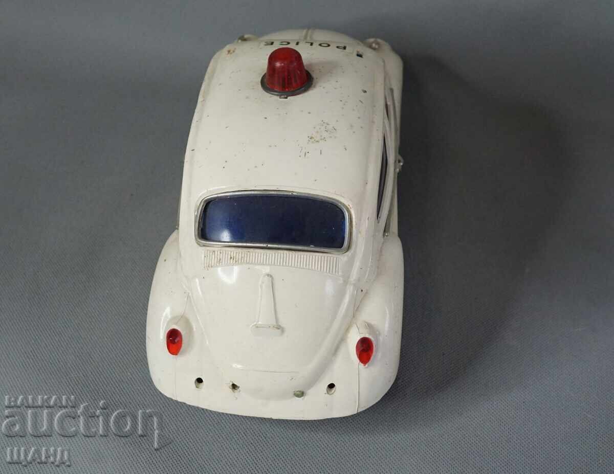Delivery of LYRA VW BEETLE Old Greek toy model car police
