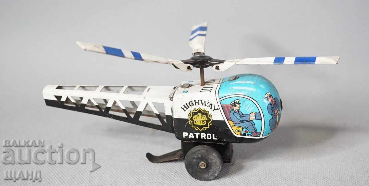 Παλιό μεταλλικό παιχνίδι μοντέλο ελικοπτέρου αστυνομία Παλιό μεταλλικό παιχνίδι μοντέλο ελικοπτέρου αστυνομία