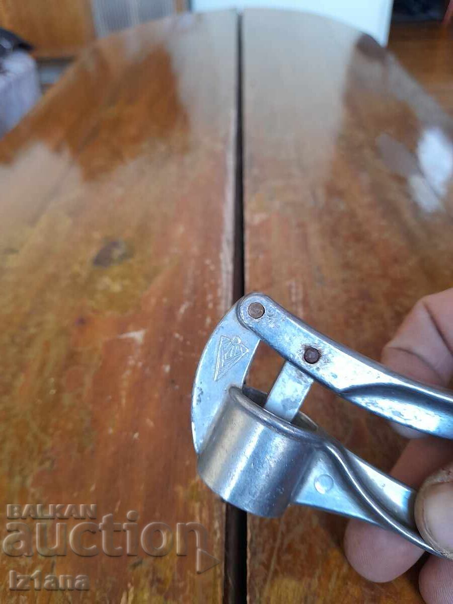 Auction Old aluminum garlic press Auction Old aluminum garlic press
