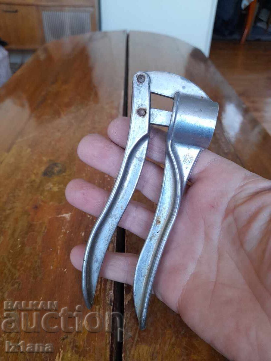 Delivery of Old aluminum garlic press Delivery of Old aluminum garlic press