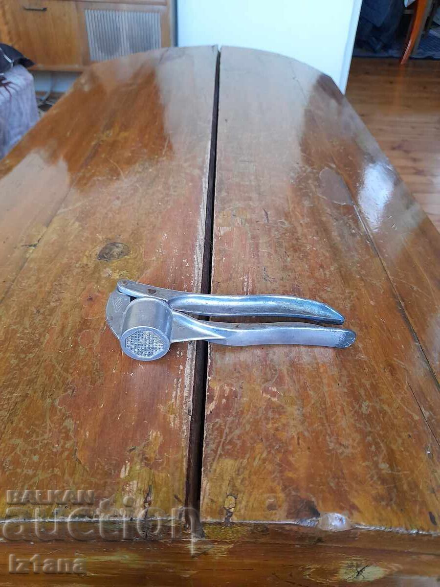 Old aluminum garlic press Old aluminum garlic press