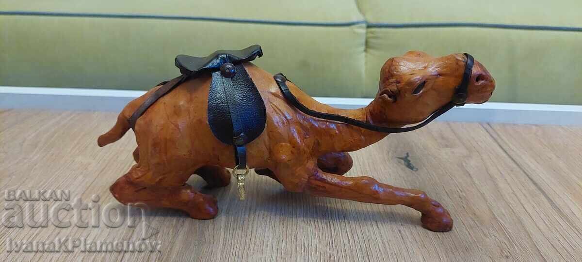 Leather-wrapped figurine for connoisseurs