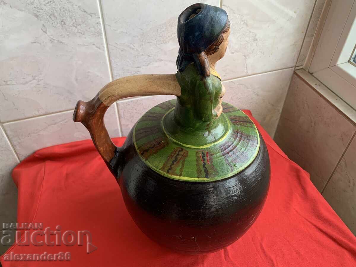 Delivery of Old wedding jug, girl with rabbit Delivery of Old wedding jug, girl with rabbit