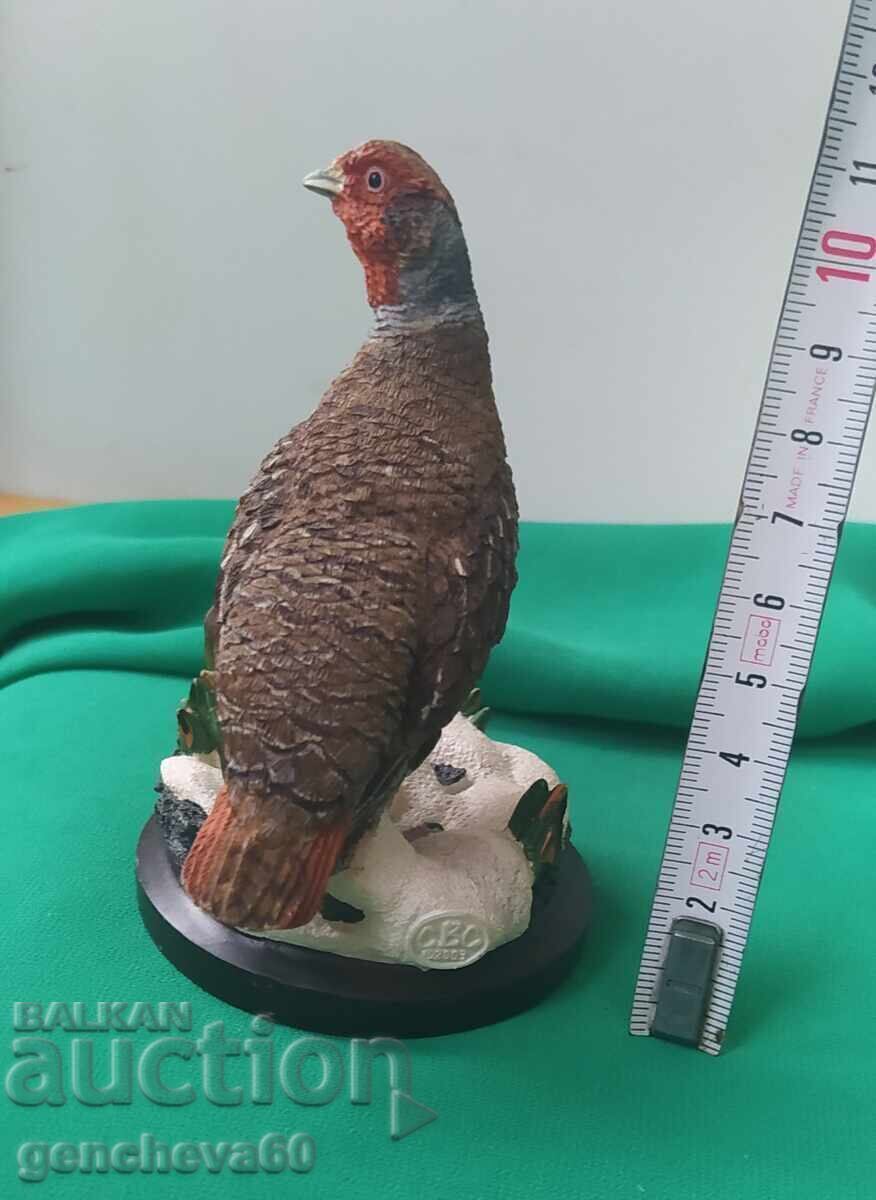 Delivery of Vintage figurine of a gray partridge/Andy Pierce Delivery of Vintage figurine of a gray partridge/Andy Pierce