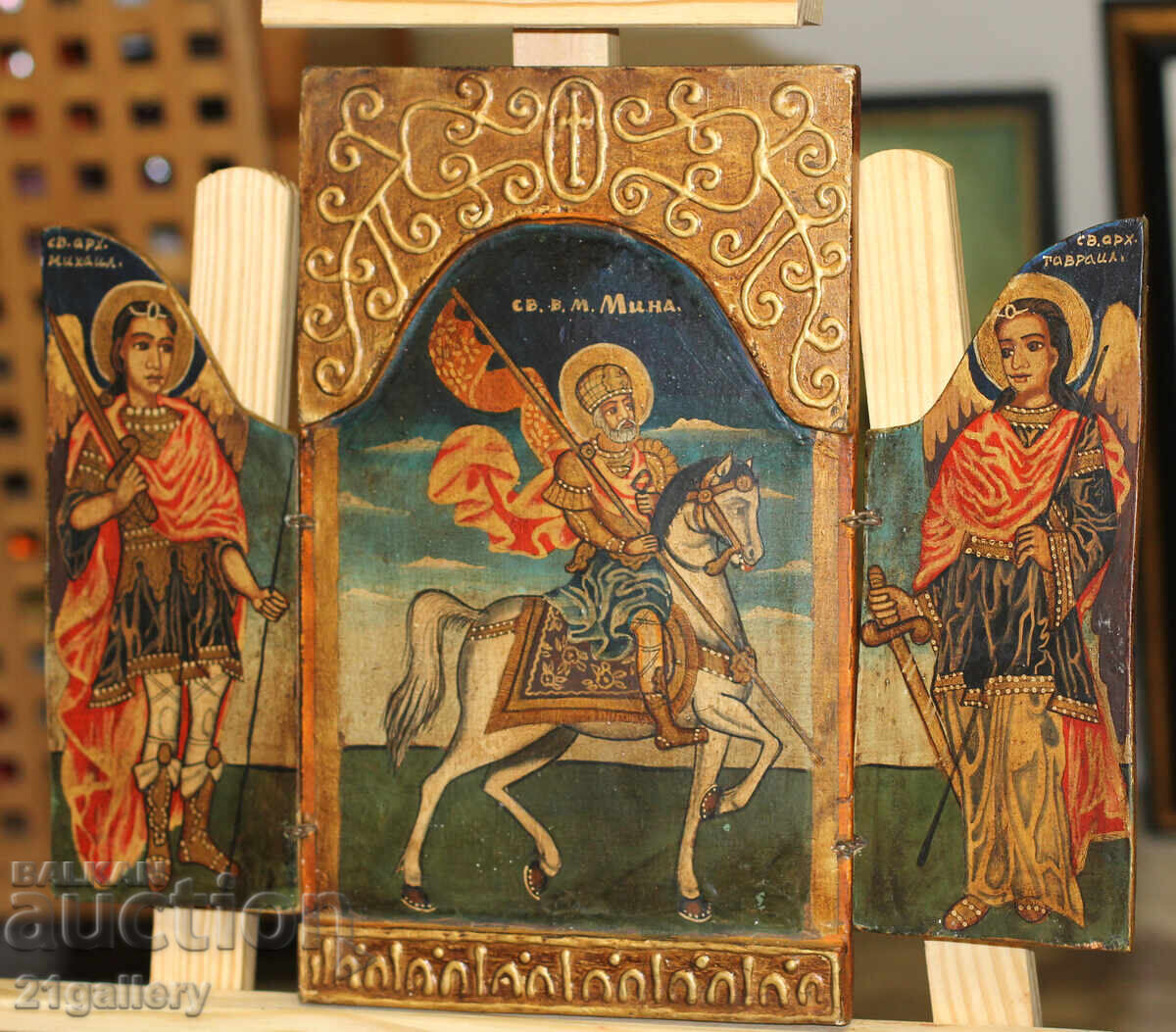 Hand-painted triptych icon of Saint Mina with price 550.00 BGN | € 281.21 Hand-painted triptych icon of Saint Mina with price 550.00 BGN | € 281.21