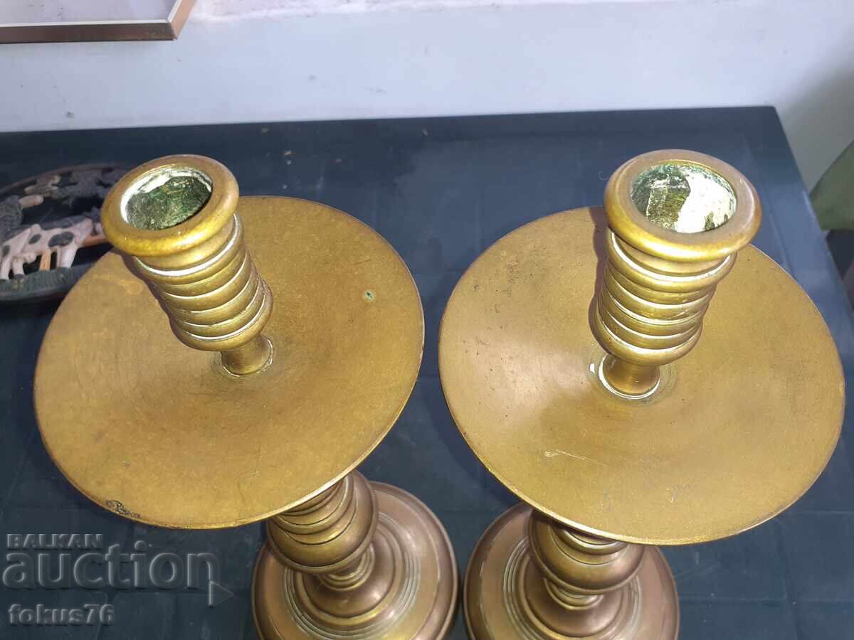 Auction Pair of incredible antique bronze candlesticks Auction Pair of incredible antique bronze candlesticks