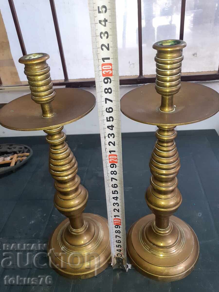 Delivery of Pair of incredible antique bronze candlesticks Delivery of Pair of incredible antique bronze candlesticks