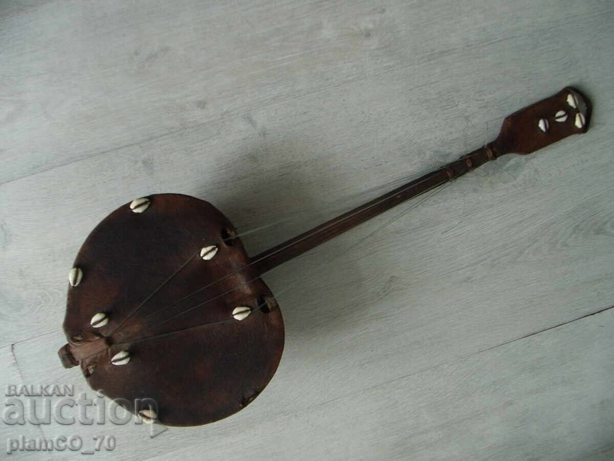 №*7962 Instrument muzical african vechi - kora cu preț 45.00 BGN | € 23.01 №*7962 Instrument muzical african vechi - kora cu preț 45.00 BGN | € 23.01