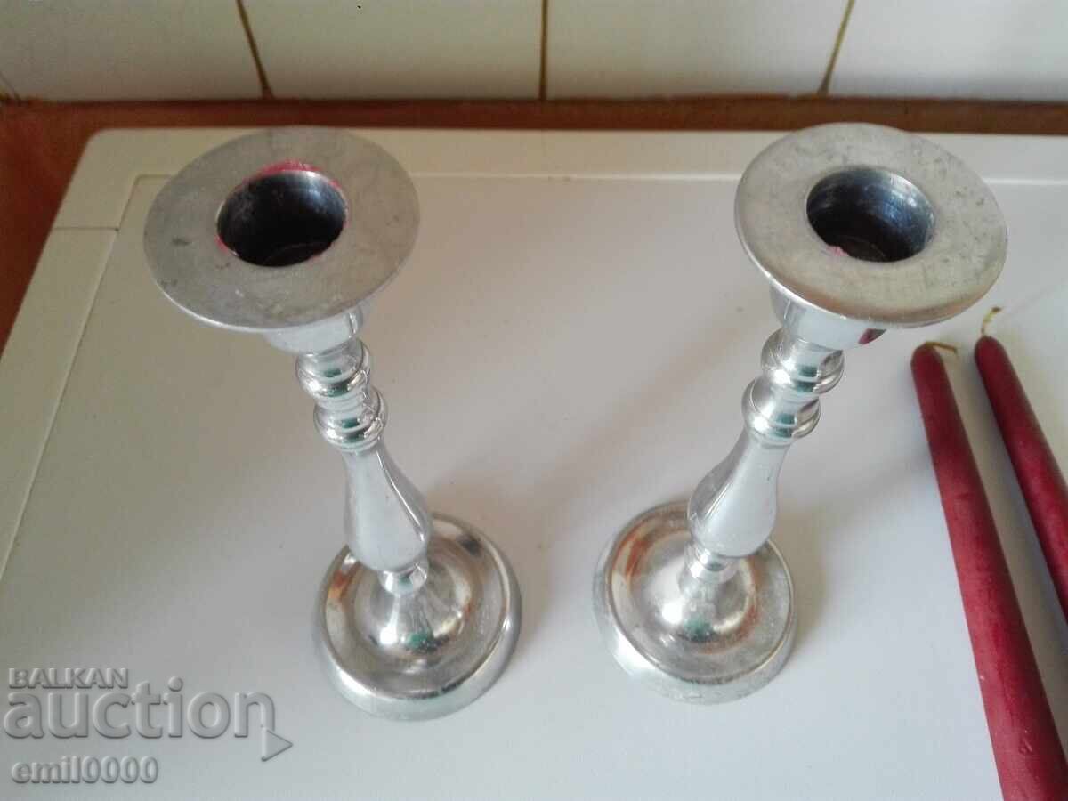 Auction Two metal candlesticks Auction Two metal candlesticks