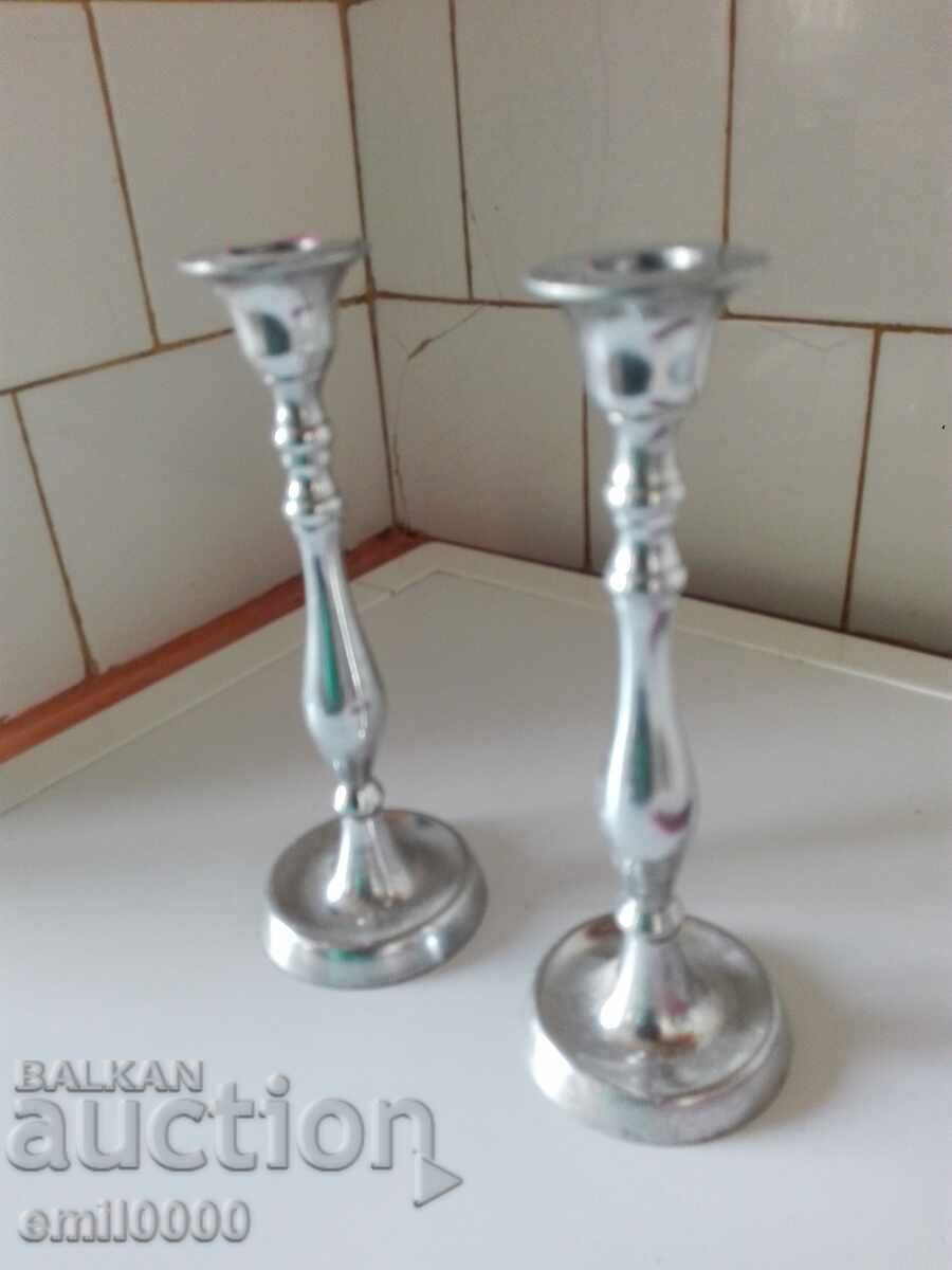 Delivery of Two metal candlesticks Delivery of Two metal candlesticks