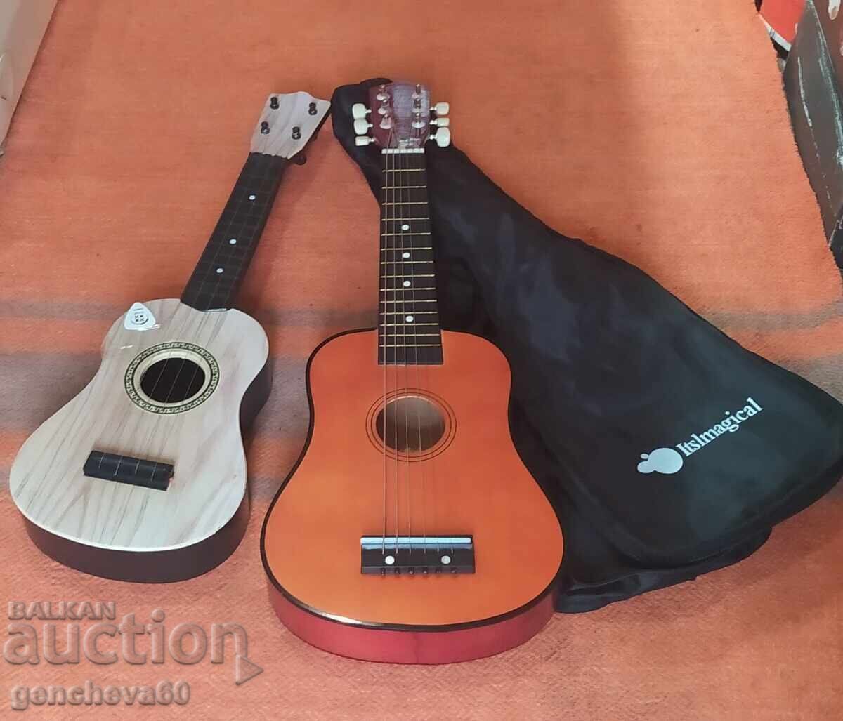 Delivery of Three children's classical guitars 62cm. and others