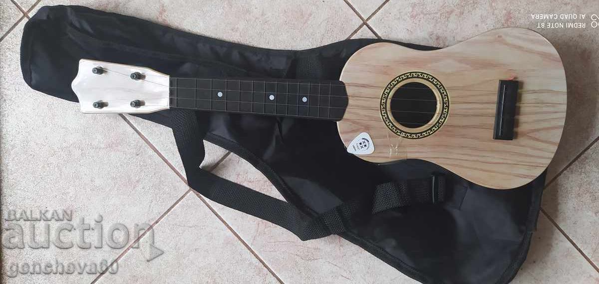Three children's classical guitars 62cm. and others - 6