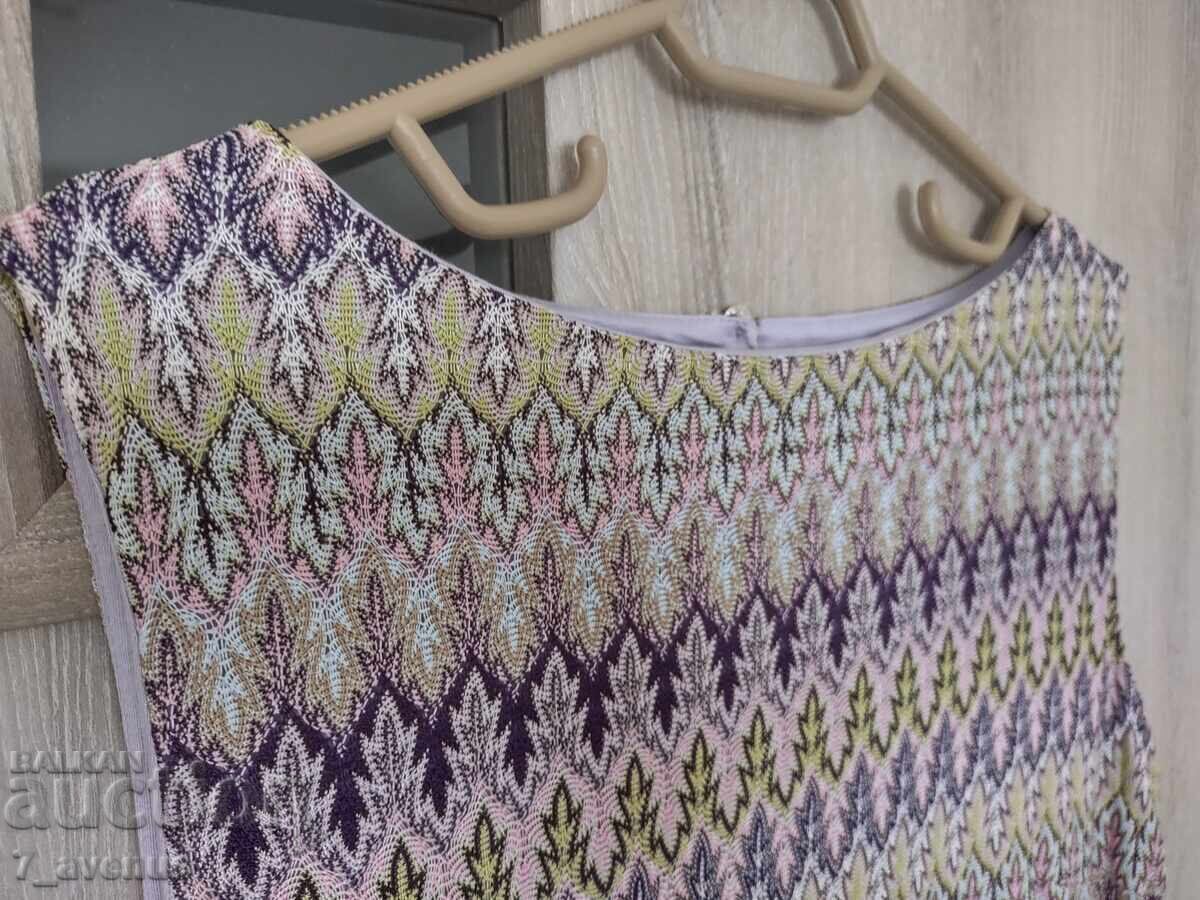 Designer dress in delicate tones, ankle-length, 04/04/25 Designer dress in delicate tones, ankle-length, 04/04/25