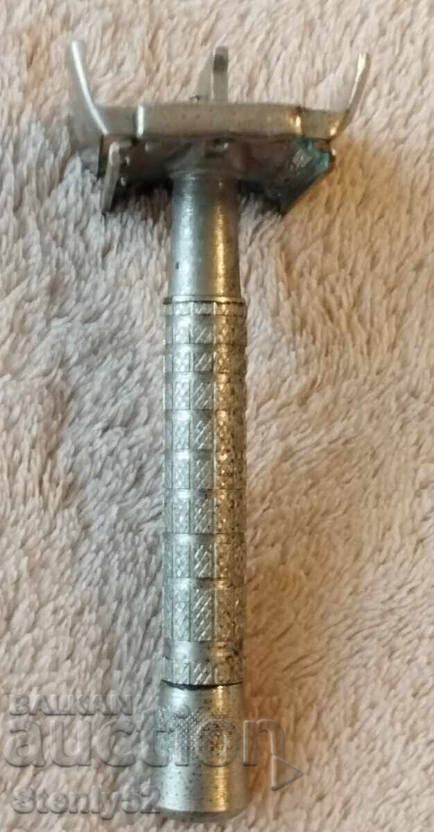 Old semi-automatic brass razor