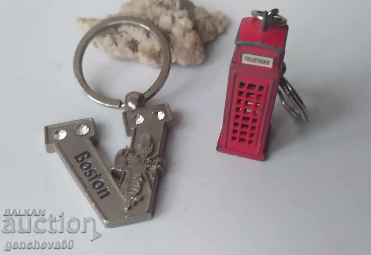Silver metal keychain Boston and another