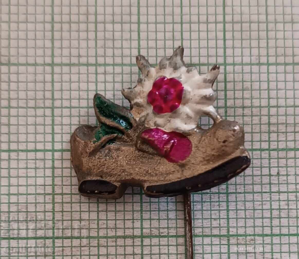 Παλαιό σήμα παπουτσιού με εντελβάις