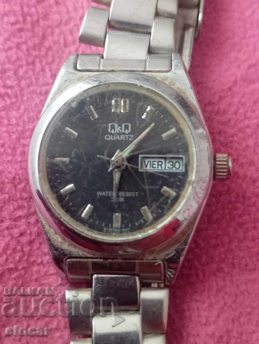 часовник Q Q