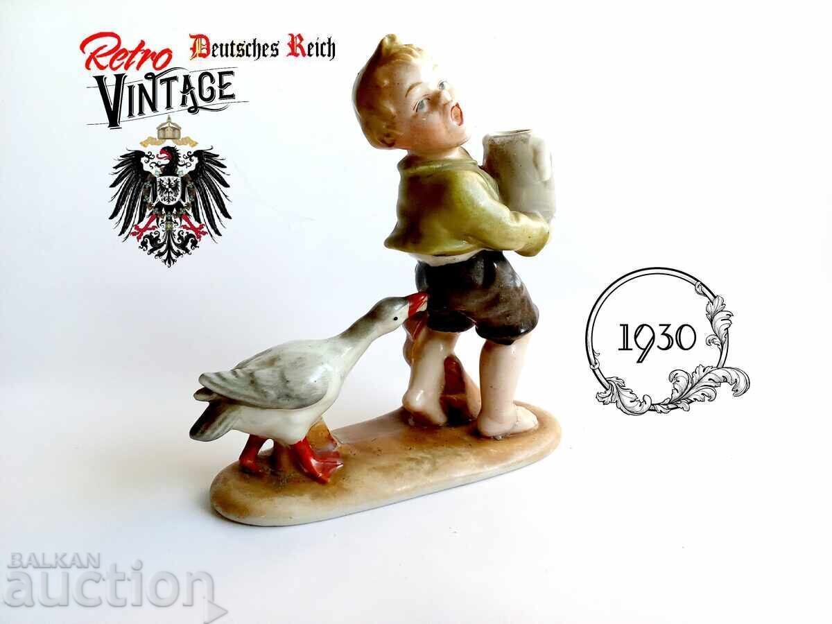 Figurină Băiat cu cană și gâscă 1930 Figurină Băiat cu cană și gâscă 1930