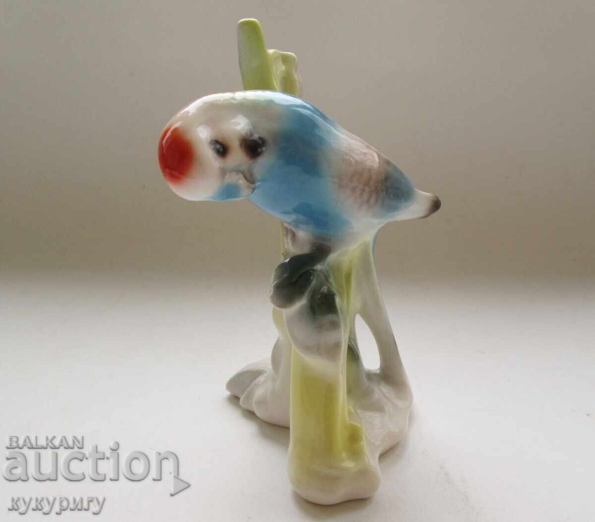 Delivery of Old porcelain figurine of a parrot