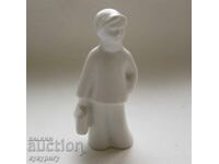 Statuetă veche din porțelan, figură de fetiță cu poșetă