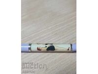 Retro pen with a stripping woman