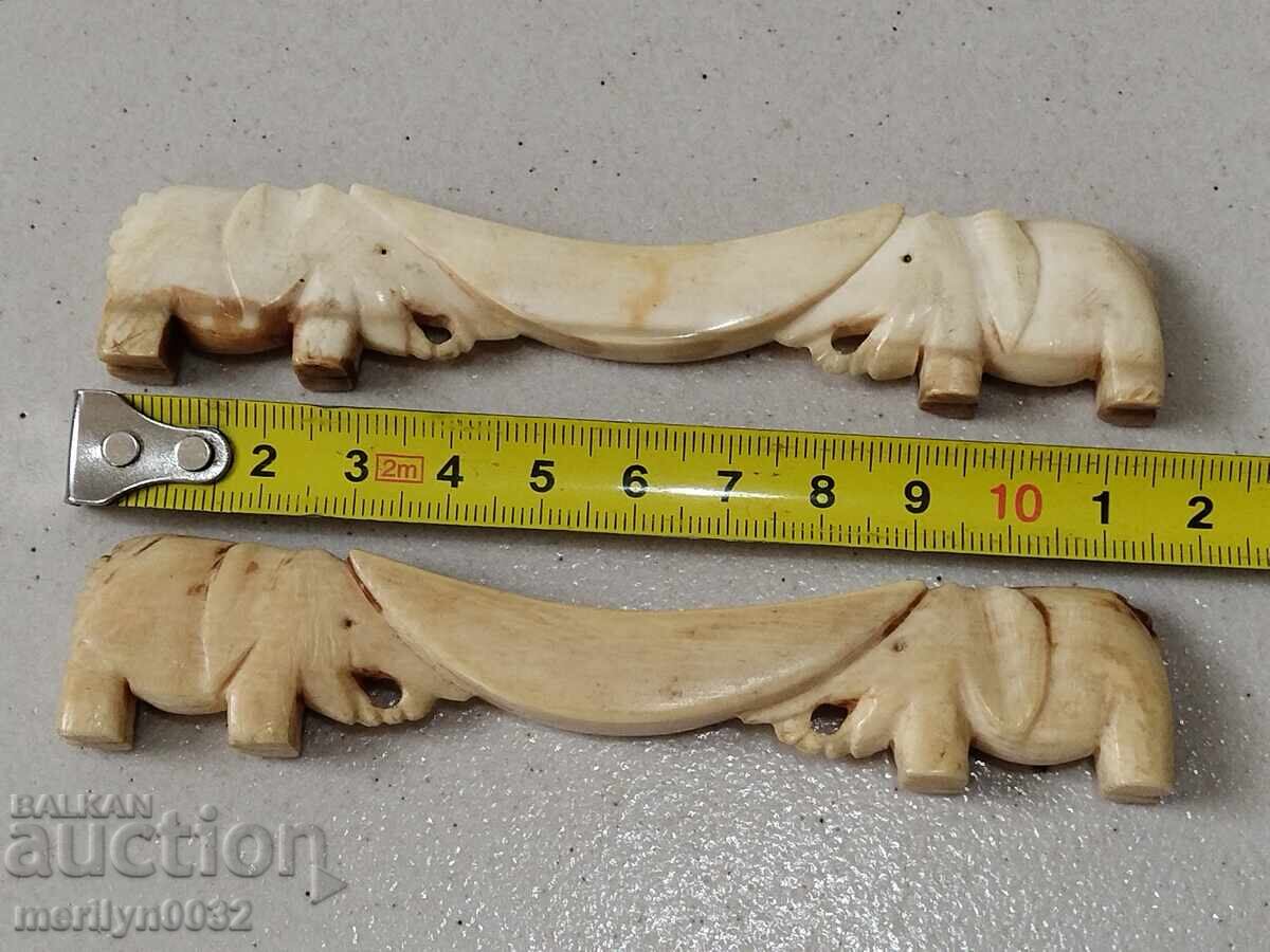 Auction  Ivory elephant stands for silverware