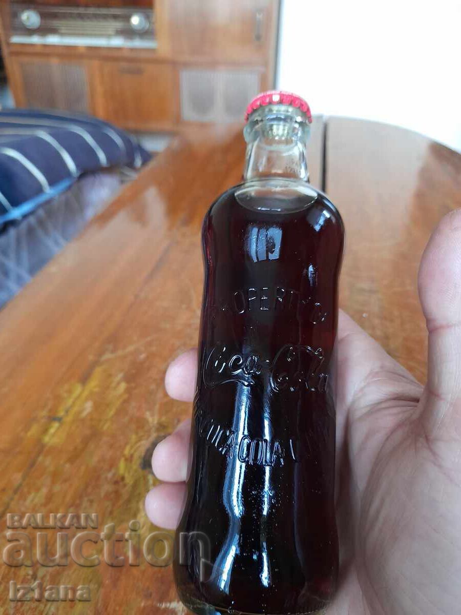 An old bottle of Coca Cola, Coca Cola with price 32.00 BGN | € 16.36 An old bottle of Coca Cola, Coca Cola with price 32.00 BGN | € 16.36
