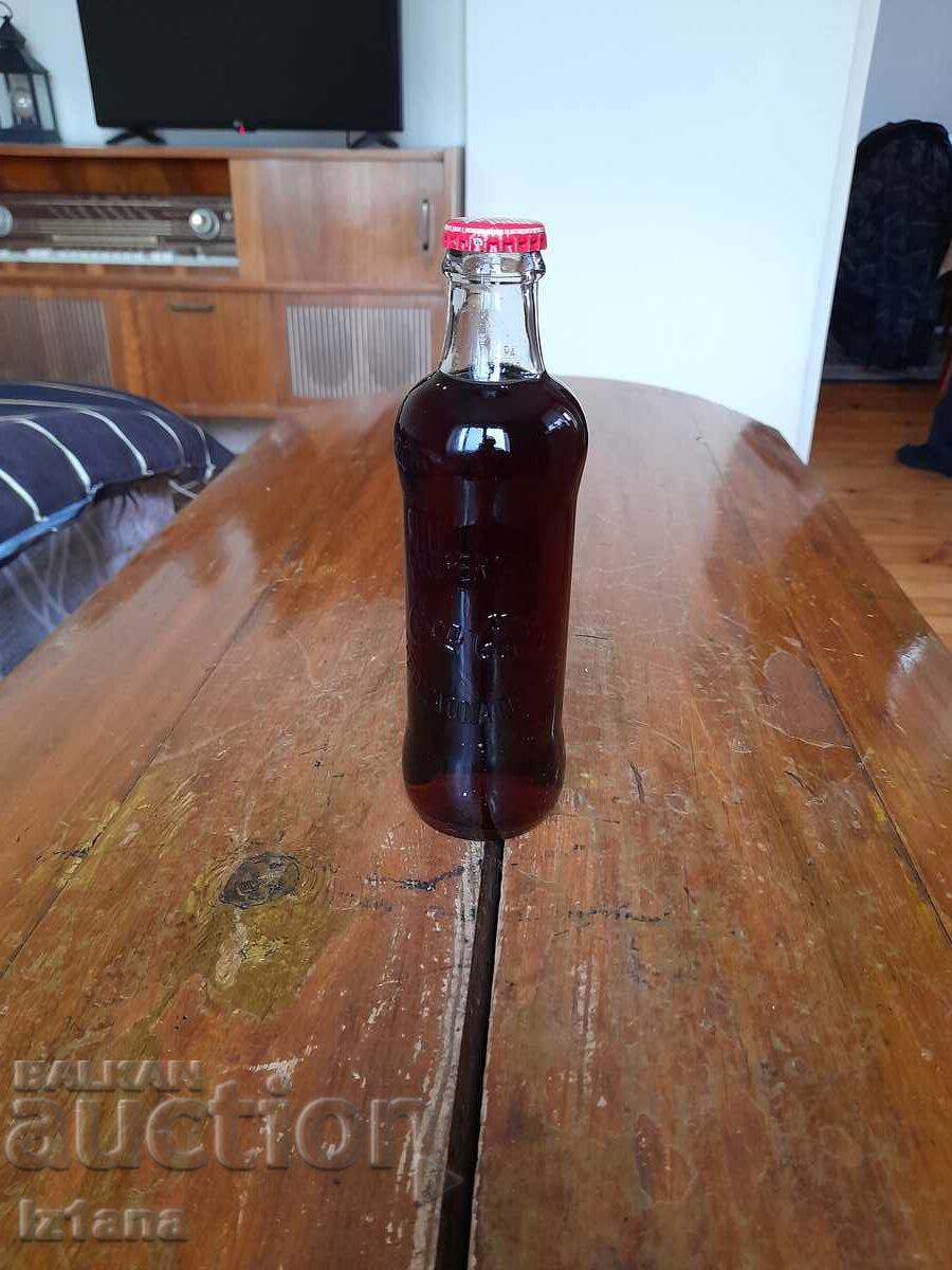 An old bottle of Coca Cola, Coca Cola An old bottle of Coca Cola, Coca Cola
