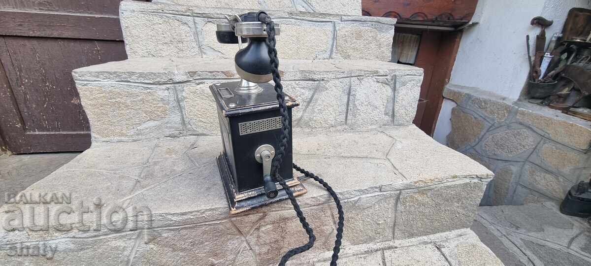 Old phone with emblem with price 150.00 BGN | € 76.69